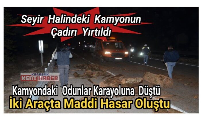 Kamyondaki odunlar karayoluna düştü, iki araçta maddi hasar oluştu