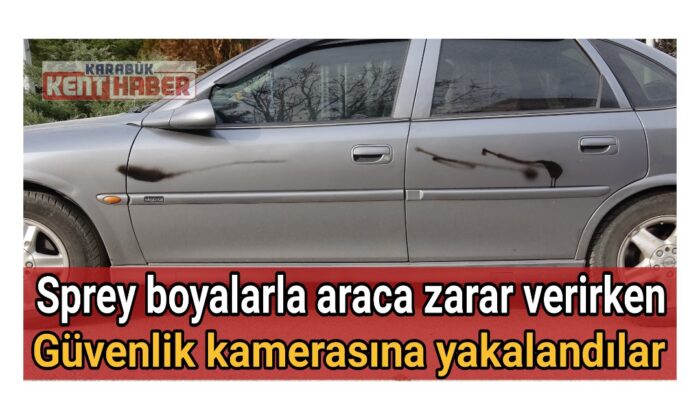 Sprey boyalarla araca zarar verirken güvenlik kamerasına yakalandılar