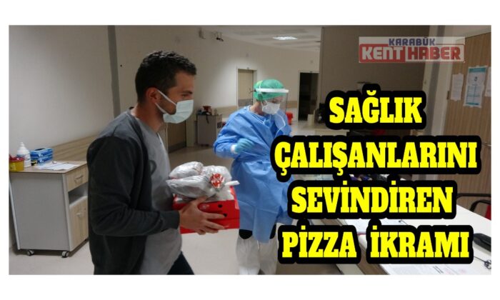 Sağlık çalışanlarını sevindiren pizza ikramı