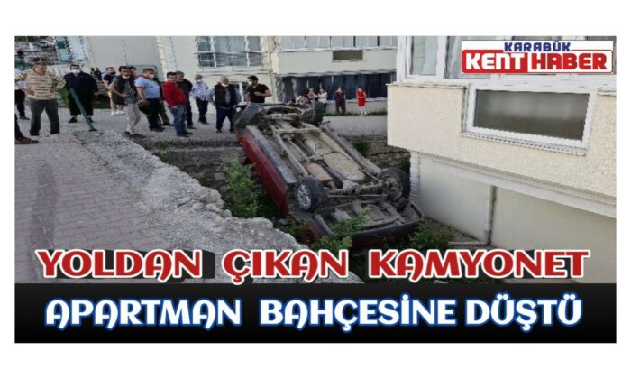 Yoldan çıkan kamyonet apartman bahçesine düştü