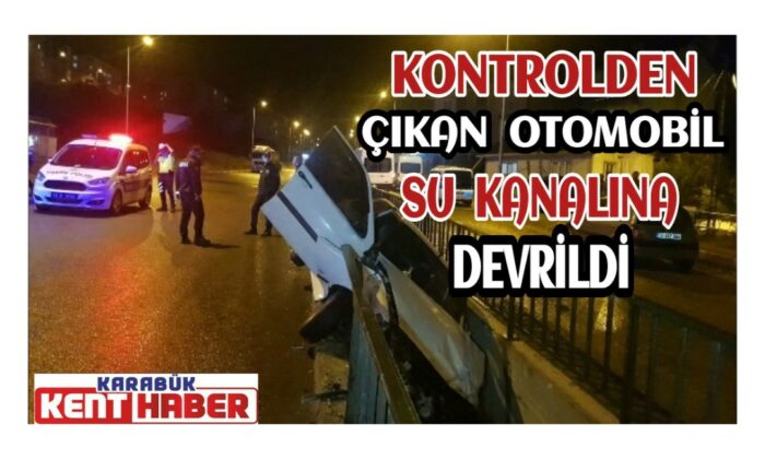 Kontrolden çıkan otomobil su kanalına devrildi